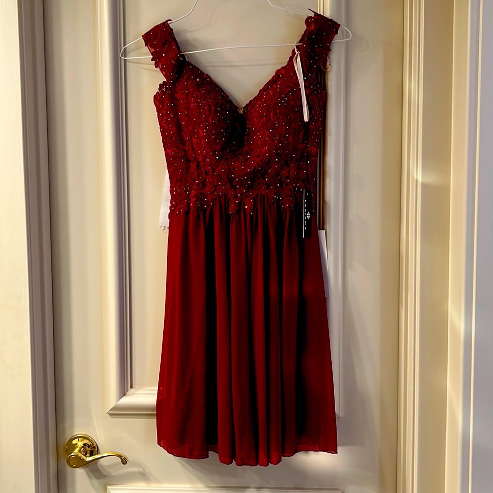 Red fancy beaded and laced dress